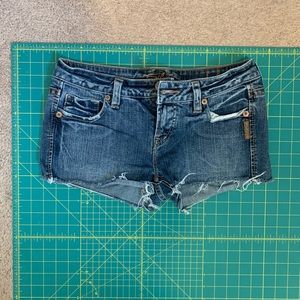 Silver cutoff denim shorts size 29.